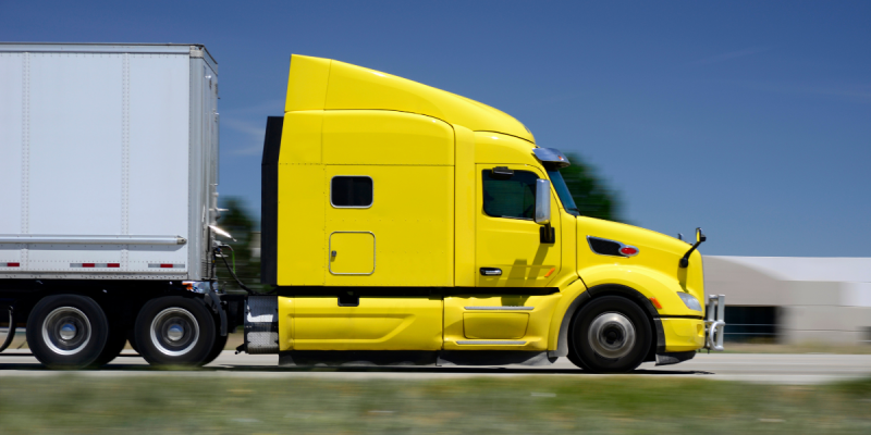 Tractor-Trailer driving down road | truck accident injury | Vinkler Law Offices