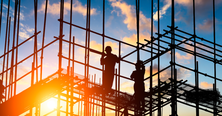 construction workers on building in Chicago | No-Fault Workers Compensation and Accident Lawsuits | Vinkler Law Offices